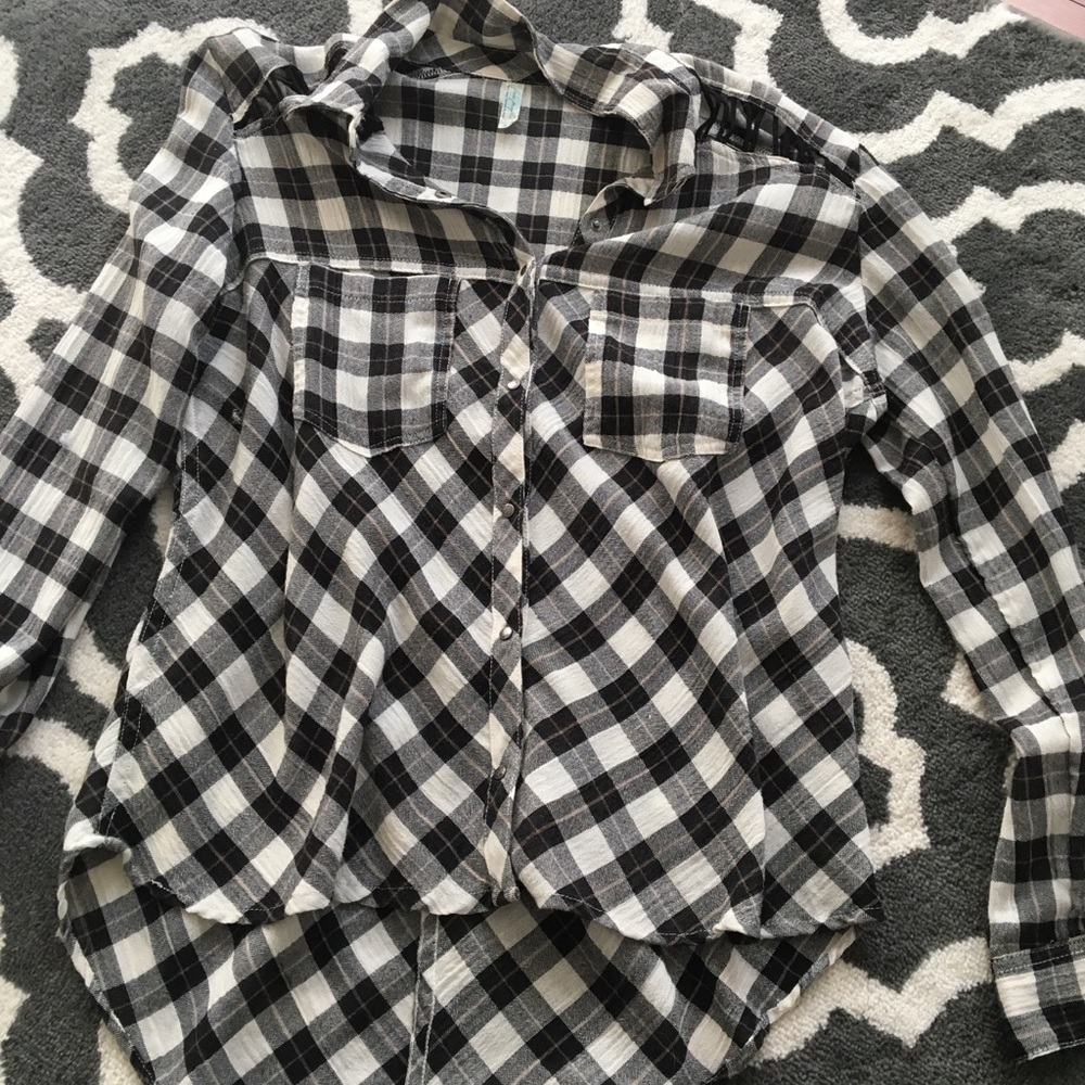 Free people cutout black flannel top. Size Medium.